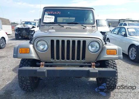 2004 Jeep Wrangler Unlimited z USA, uszkodzony, nr VIN 1J4FA49SX4P774167